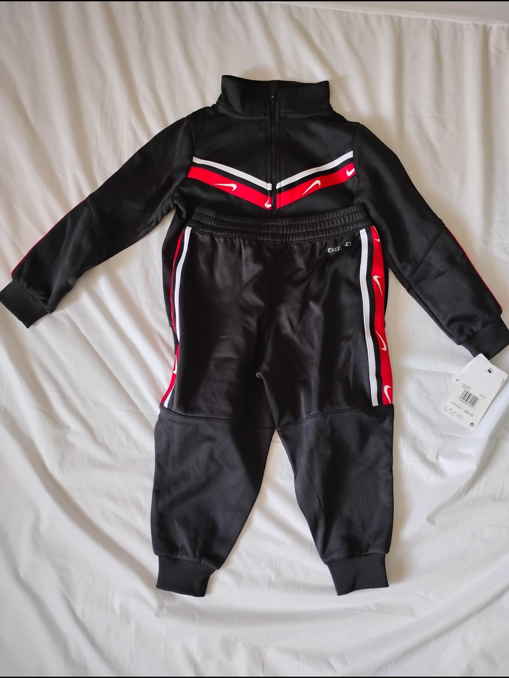 Nike Black Tracksuit Set with Red & White Stripe Accents